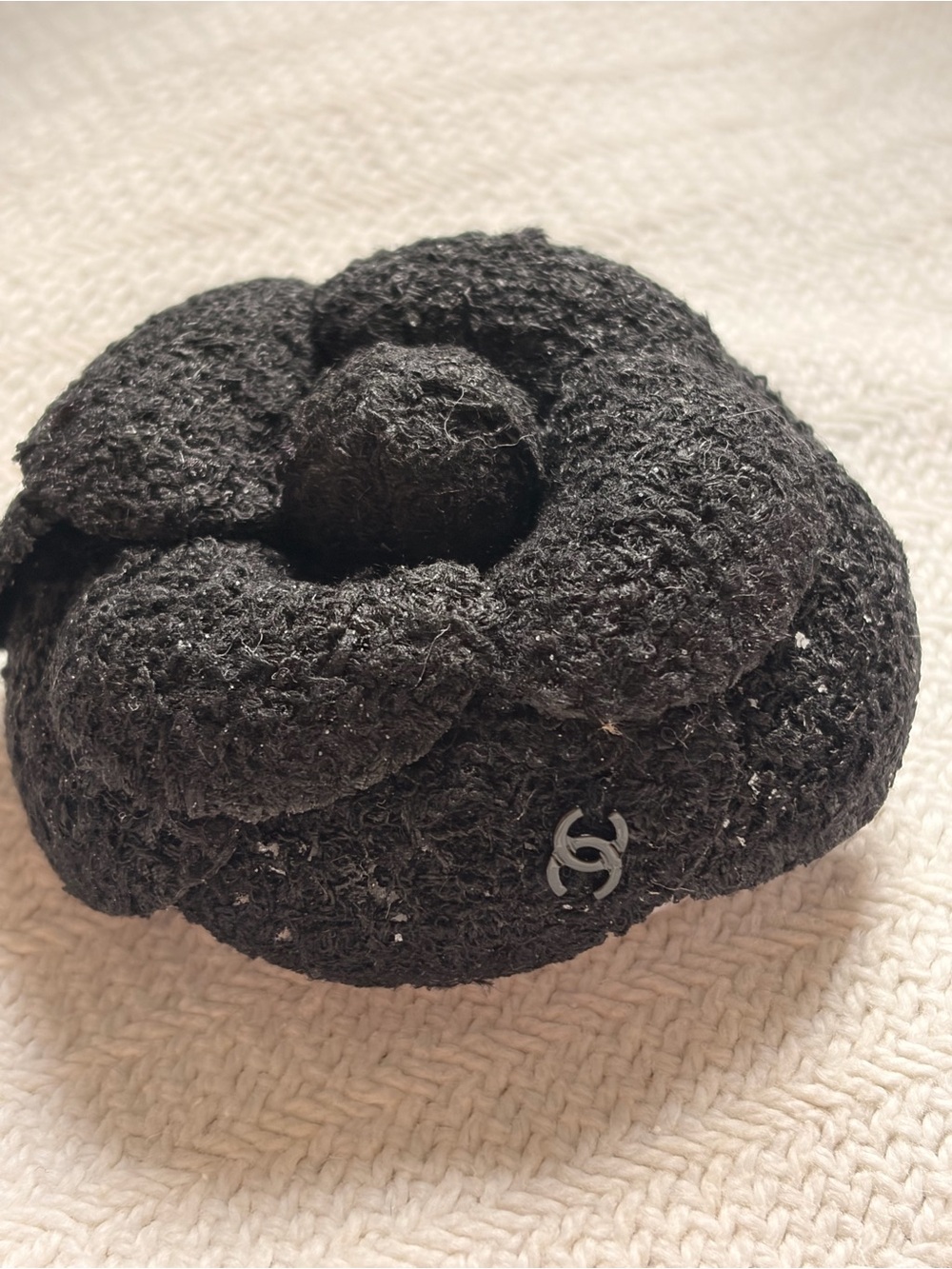 CHANEL Black Bouclé Camellia Brooch with Interlocking CC Charm